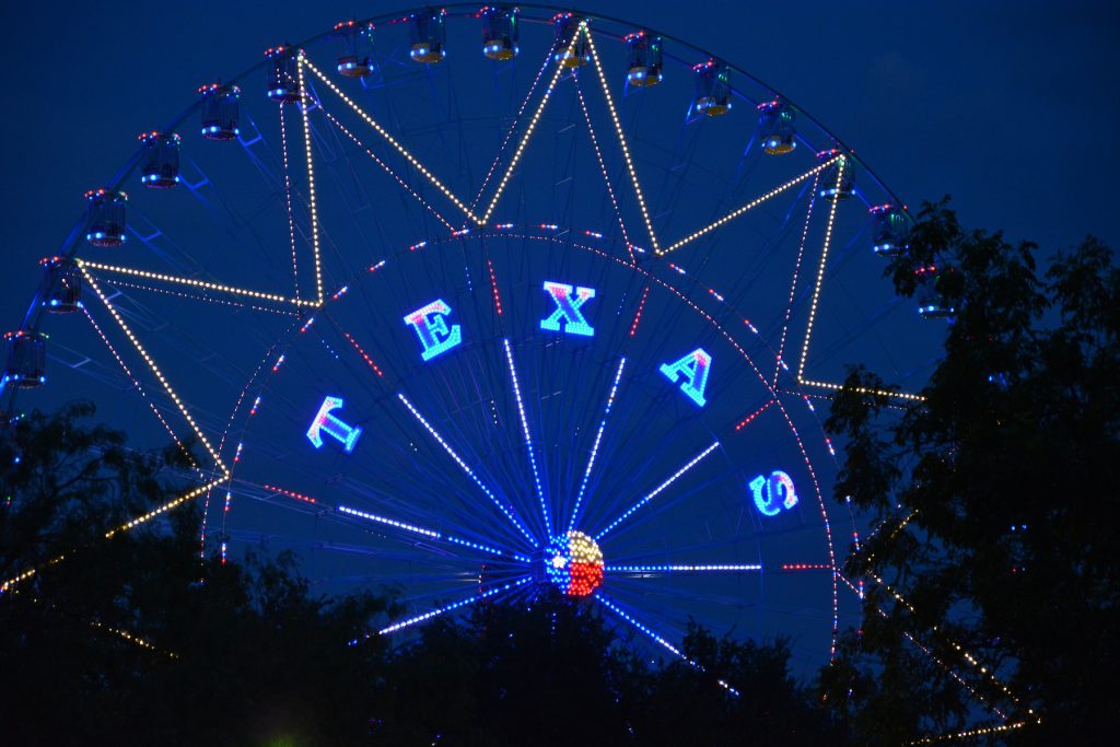 The word Texas on a Ferris wheel in a Dallas park and events ground
